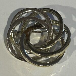 Vintage 1980s Monet Silver- Tone, Swirl/ Knot Elegant Brooch.